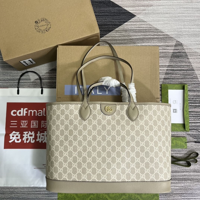 G*u*i shopping bags